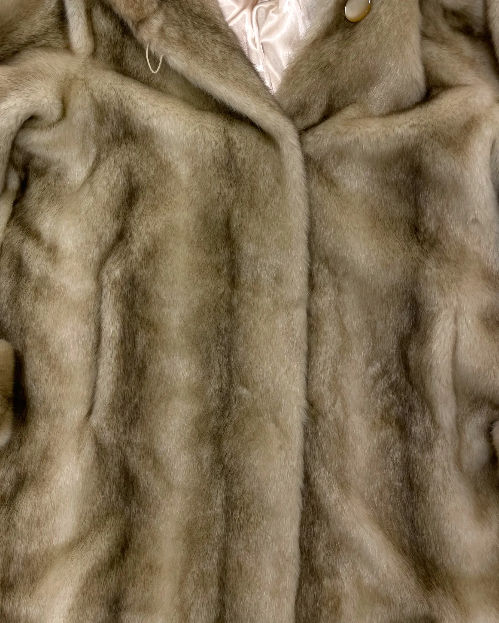 Certainly! To optimize the e-commerce product title, we should include key descriptors that highlight important features, appeal to potential buyers, and improve searchability. Heres an optimized version:

Dennis Basso Luxurious Mid-Length Faux Fur Coat for Women - Chic and Elegant Design